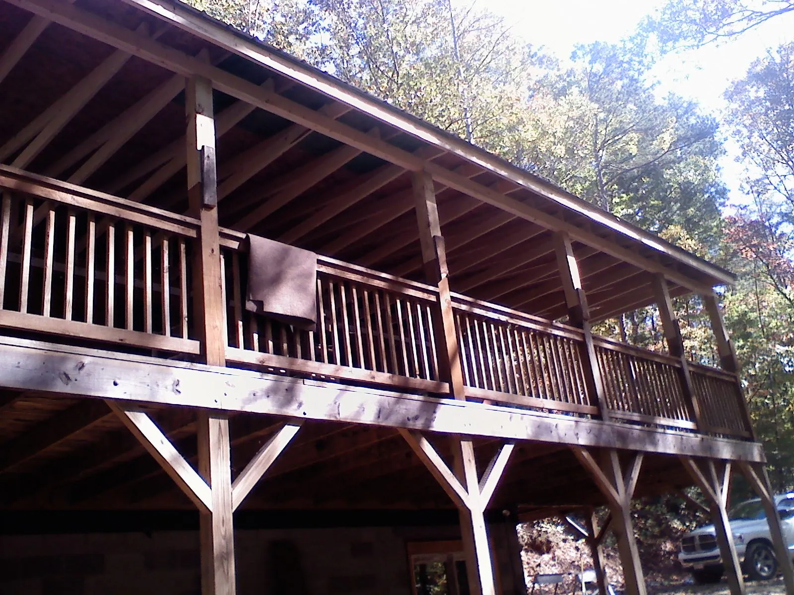 Timber framing under a new elevated porch and deck — Roof Leak Repair in Reagan by Roofing Brothers
